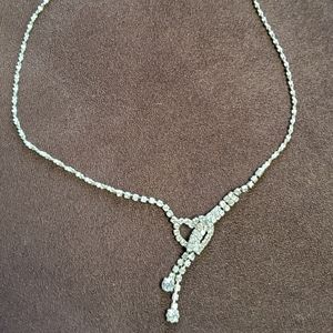 Silver-toned formal necklace.